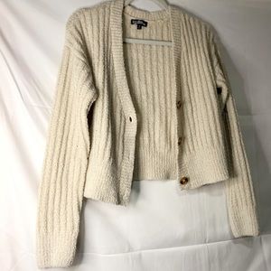 Cropped long sleeve knit top